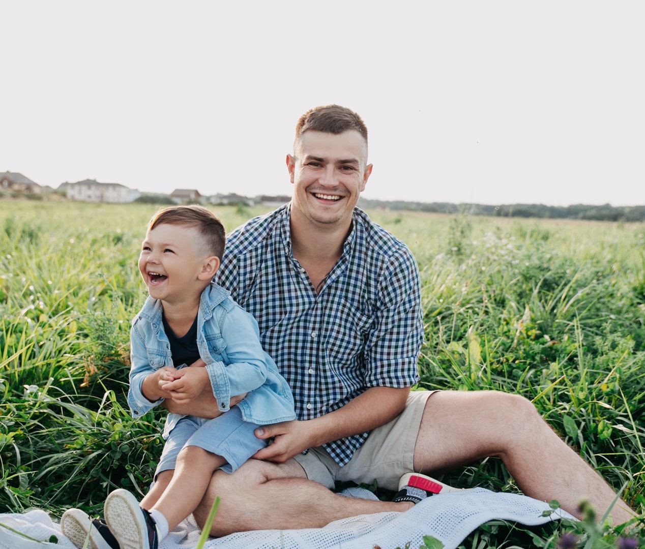 Happy father and son after dental care at James Dental in Des Moines IA