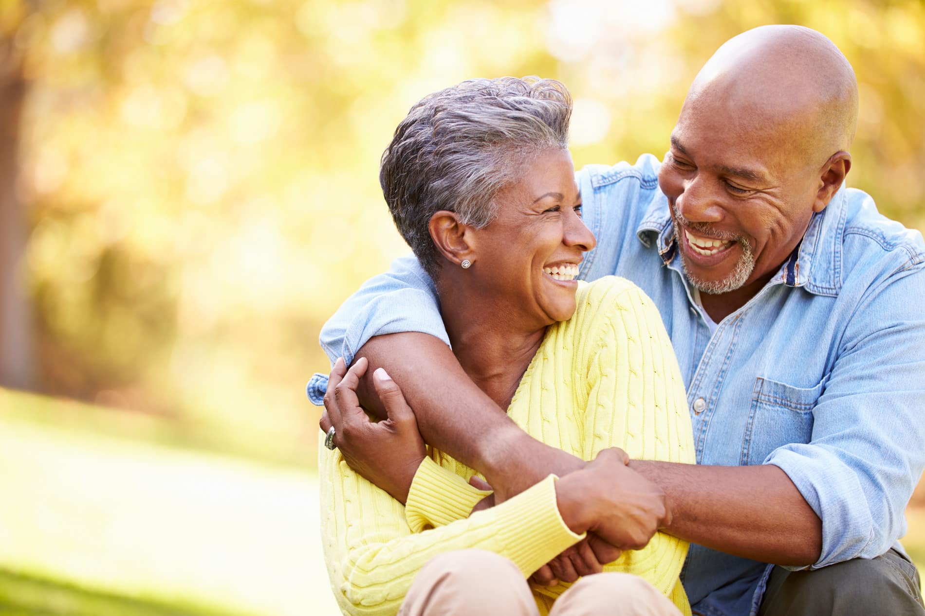 AdobeStock_62351982 v2 Man and woman hugging after successful restorative dental treatment in Des Moines IA