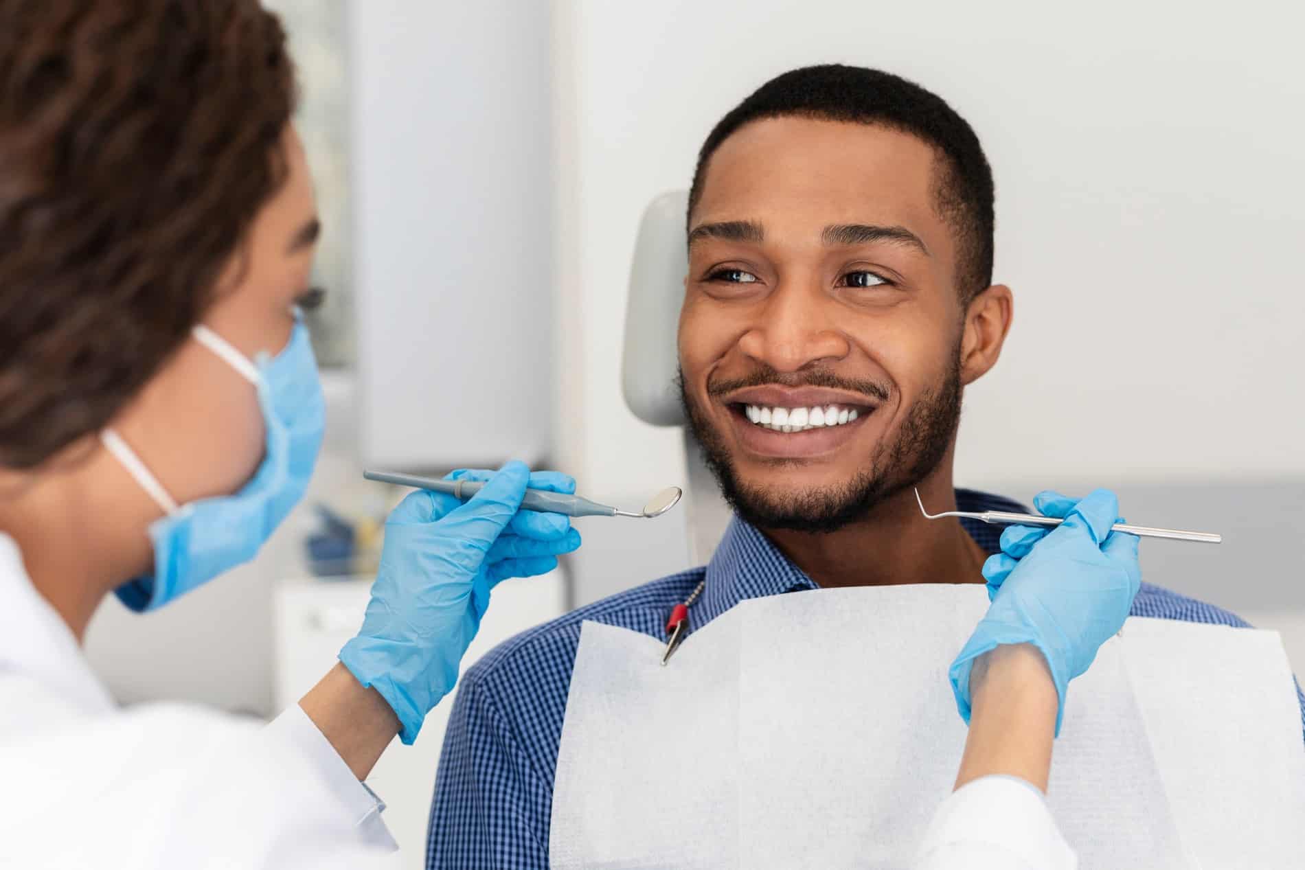 AdobeStock_341761627 v2 Man at his dental crown appointment in Des Moines