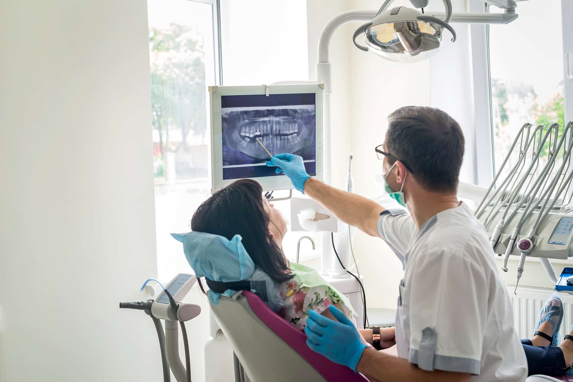 Woman at her periodontal deep cleaning appointment in Des Moines IA