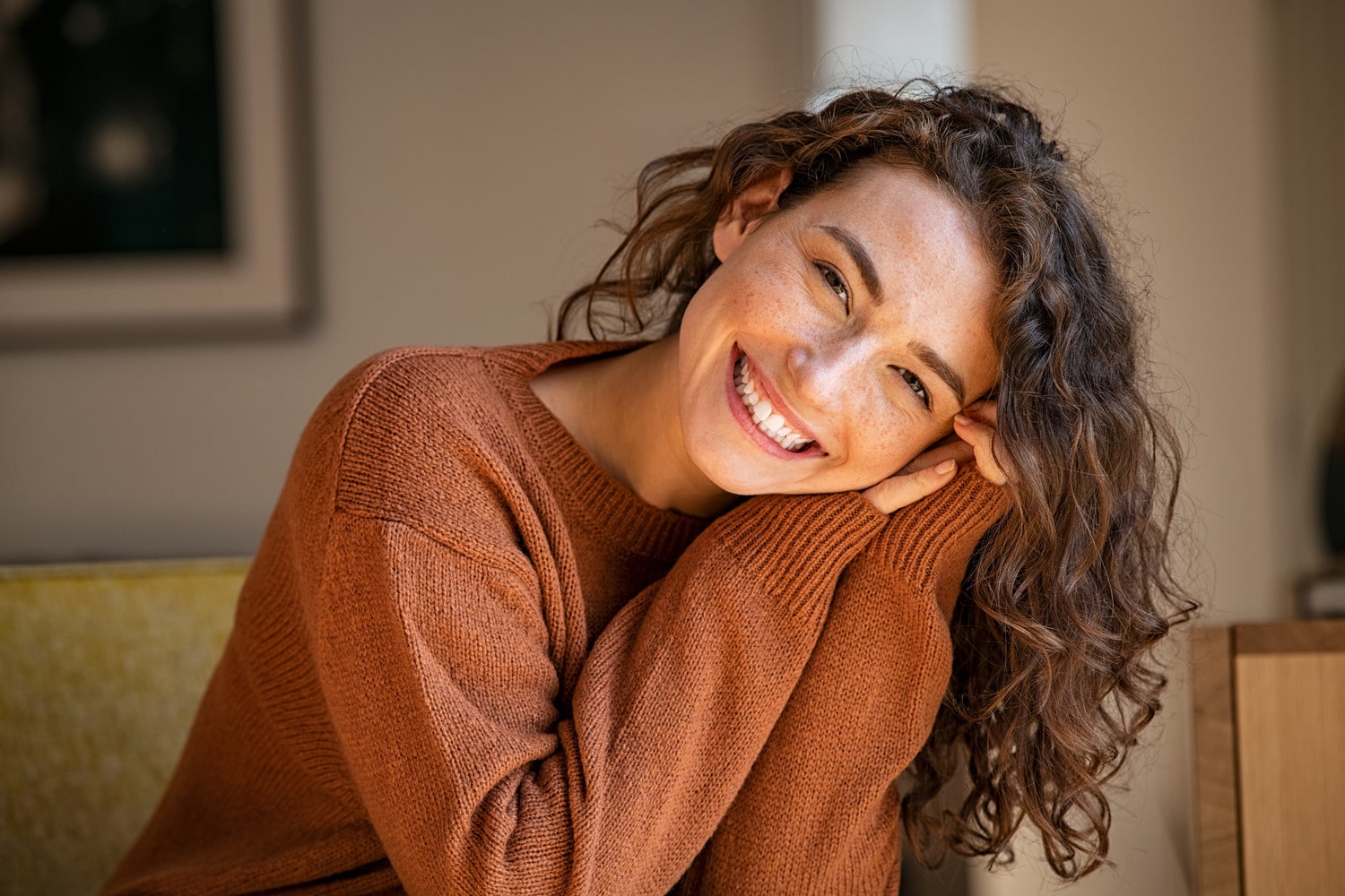 Woman smiling at the dental office for a dental fillings appointment in Des Moines IA