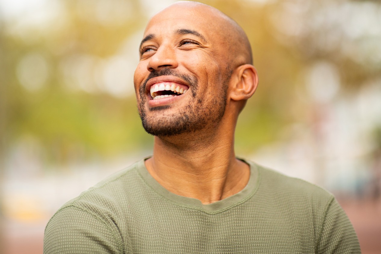Man smiles after a root canal with Dr. Cholewa in Des Moines