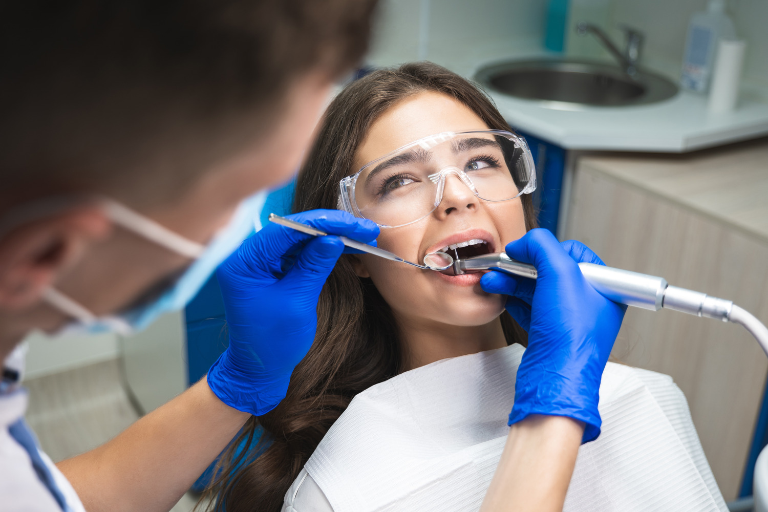 Woman get a root canal treatment in Des Moines IA